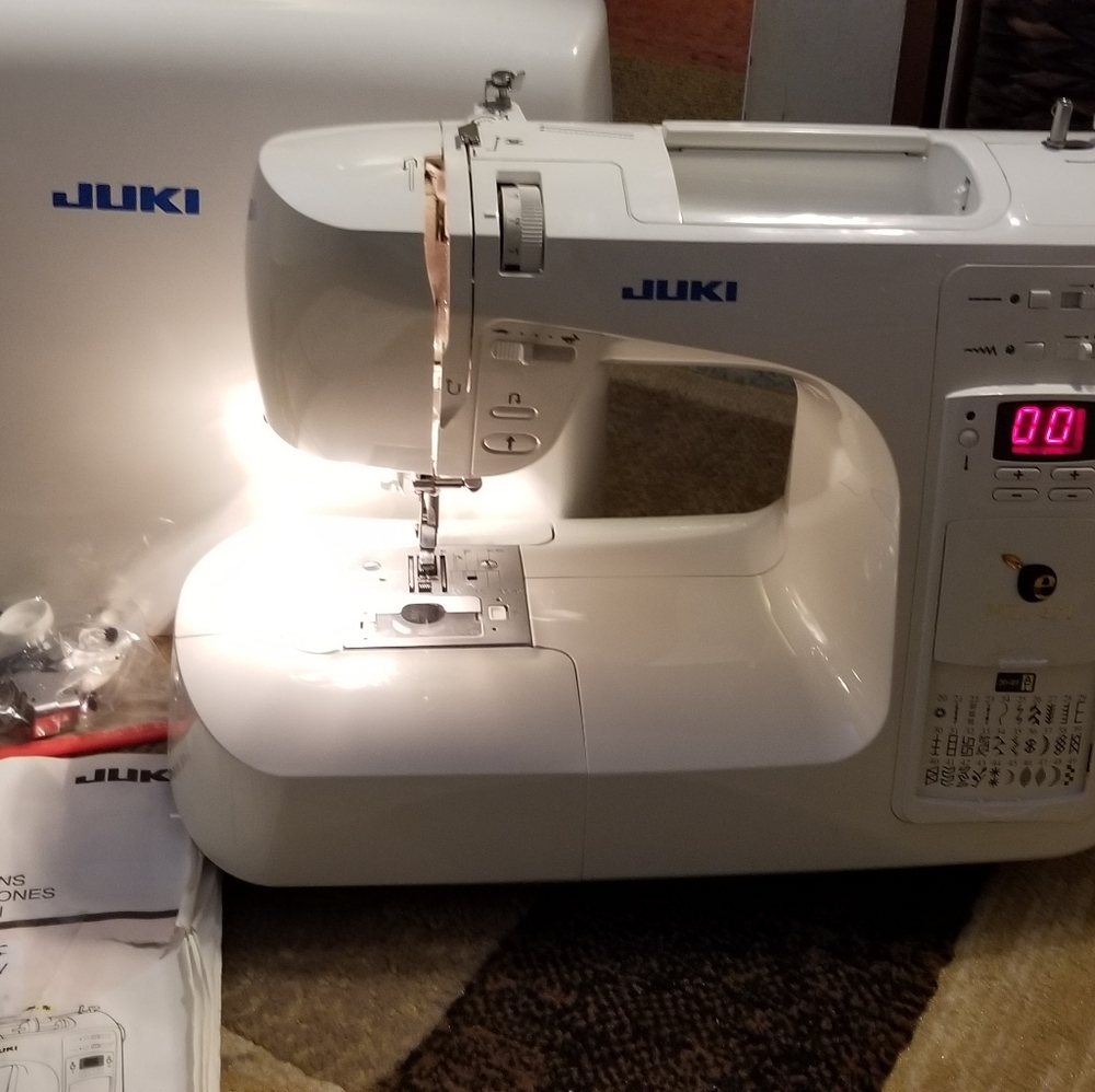 Computer sewing machine with case